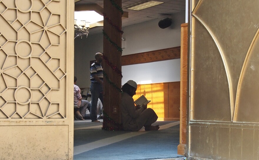 In this photo taken in 2011, worshippers are pictured inside the Al-Iman Mosque after midday prayers in the Queens borough of New York. The NYPD disbanded the special unit tasked with carrying out surveillance of Muslim groups in 2014