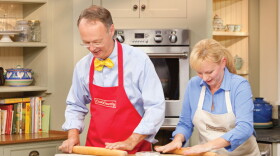 Host Chris Kimball baking with chef Bridget Lancaster in the test kitchen.