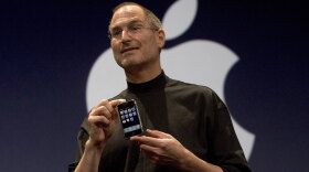Apple CEO Steve Jobs unveils the iPhone in 2007.  A new working paper suggests the spread of smartphones helps explain the persistent decline in birth rates in the nearly two decades since.
