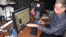 Dr. Eric Frost, director of San Diego State University's Immersive Visualization Center, explains how visualizations and maps are created using images and data during a crisis, such as the Gulf Coast oil spill, May 19, 2010.