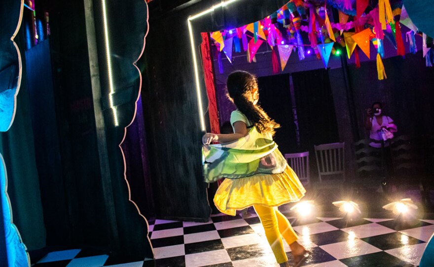 A child plays on stage in David Israel Reynoso's "Teatro Piñata" exhibition in an undated photo.