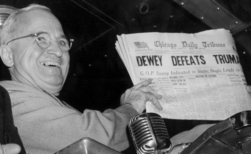 Former President Harry Truman holds up an Election Day edition of the Chicago Daily Tribune, which, based on early results, mistakenly announced "Dewey Defeats Truman" on Nov. 4, 1948.
