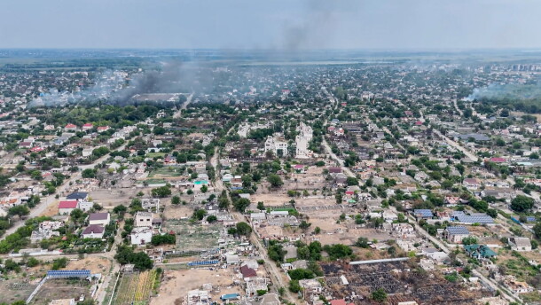 In this undated image from video provided by the Ukrainian 34th Separate Marine Brigade "Borysfen" on Sept. 22, 2026, smoke rises from a residential neighborhood in the Russian-occupied city of Oleshky in the Kherson region of Ukraine.