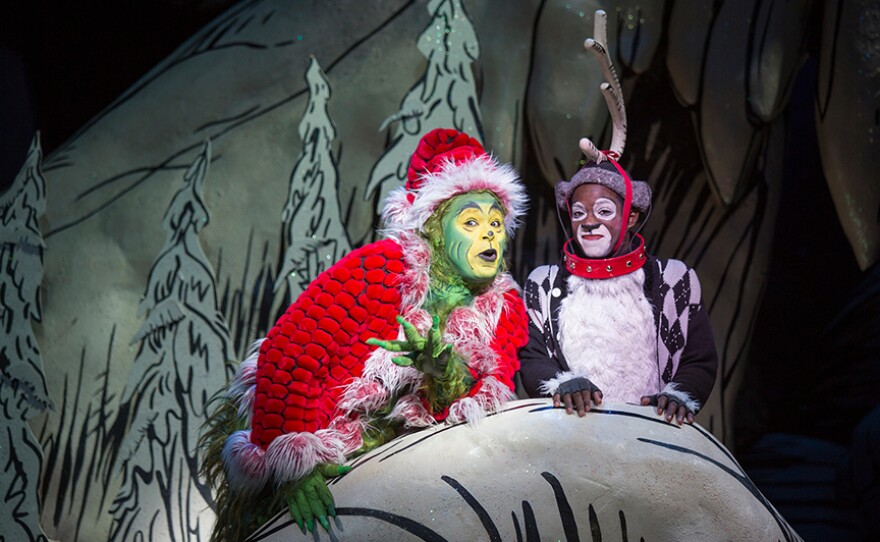 From left, J. Bernard Calloway as the Grinch and Tyrone Davis, Jr. as Young Max in Dr. Seuss’ "How the Grinch Stole Christmas!" at The Old Globe.