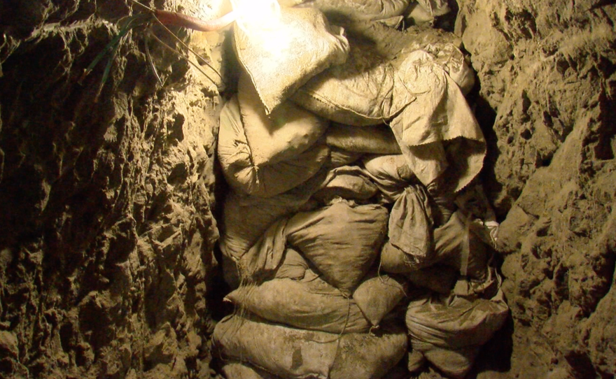 Sandbags are piled in a drug tunnel, June 12, 2017. 