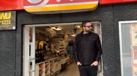 Photographer John Brady stands in front of an Oxxo convenience store in Tijuana in this photo taken Nov. 11, 2018.