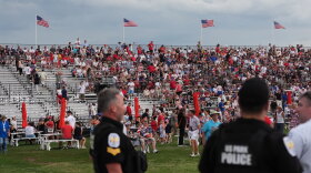 Law enforcement secure the area as people evacuate because of incoming storms that will delay the program at a Salute to America Independence Day event honoring the nation's 250th anniversary, Saturday, July 4, 2026, on the National Mall in Washington.