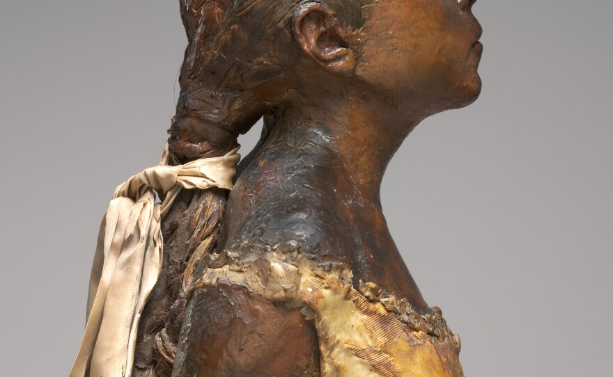 Degas used a real bodice, tutu, ribbon and even real hair in his sculpture.