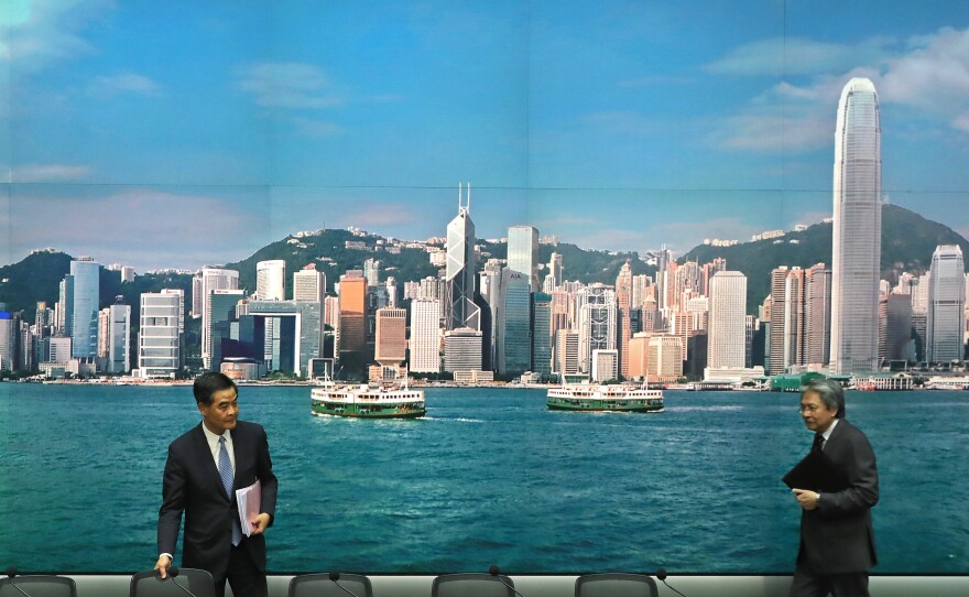 Hong Kong Chief Executive Leung Chun-ying (left), and Financial Secretary John Tsang, arrive for a press conference on Sept. 21. Many younger Hong Kong residents are critical of Leung and other political leaders in Hong Kong, saying they are too pro-China and are not fighting hard enough for Hong Kong.