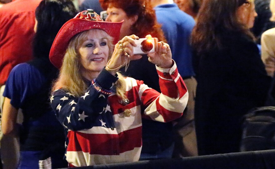 People attend a rally by Republican presidential candidate Ted Cruz in Dallas on Monday.