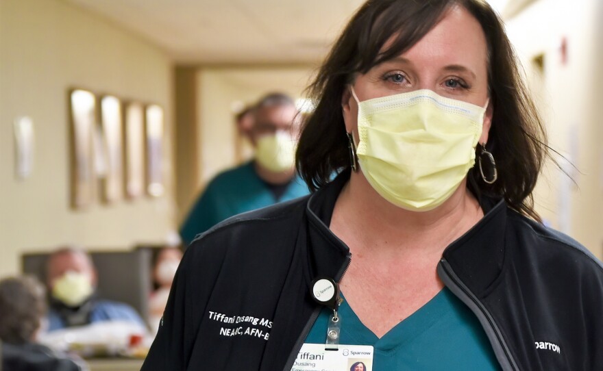 Tiffani Dusang is the director of of emergency and forensic nursing at Sparrow Hospital in Lansing, MI. As overworked nurses leave, she struggles to staff every shift, and works hard to keep remaining nurses from burning out.