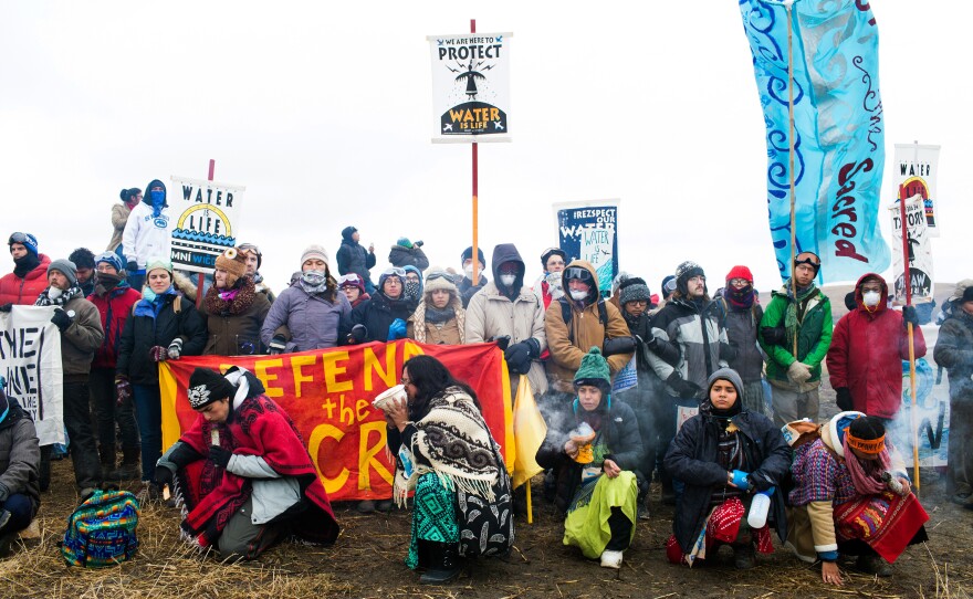 People protesting the Dakota Access Pipeline demonstrate at the Standing Rock Sioux Reservation in North Dakota on Thanksgiving Day 2016.