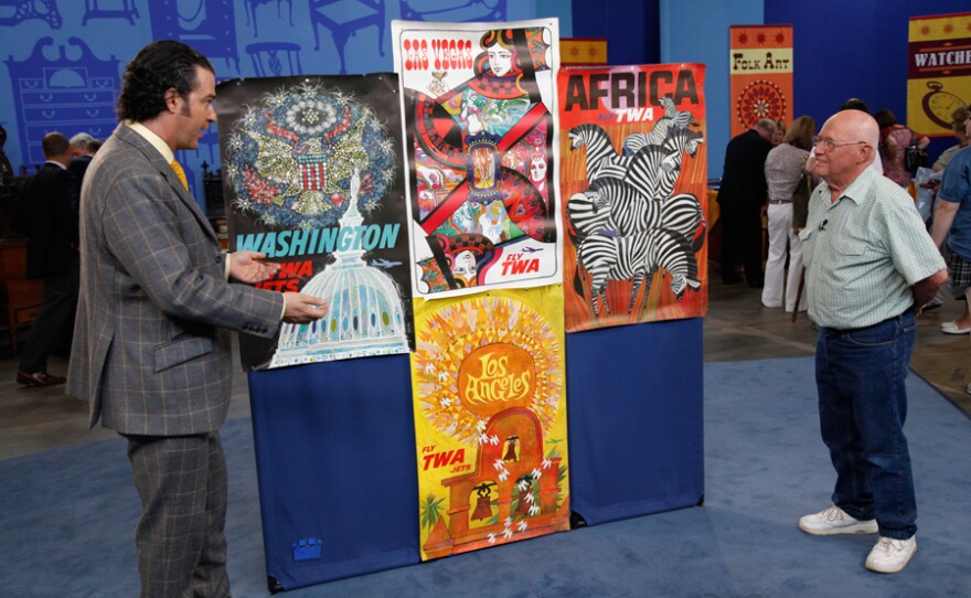 Nicholas Lowry (left) appraises a collection of David Klein TWA Posters, ca. 1960.