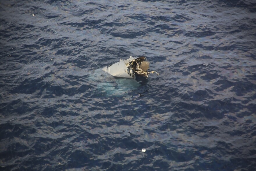 FILE - In this photo provided by Japan Coast Guard, debris believed to be from a U.S. military Osprey aircraft is seen off the coast of Yakushima Island in Kagoshima Prefecture in Japan, Nov. 29, 2023. 