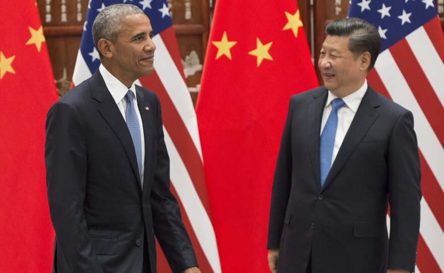 "That's part of our job," President Barack Obama said of any tensions in his visit to China. Here, Obama and President Xi Jinping attend a meeting at the West Lake State House in Hangzhou, where world leaders are gathering for the G-20 Leaders Summit.