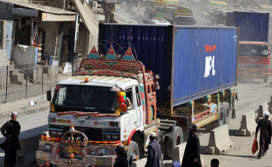Trucks and tankers carrying supplies for NATO forces in Afghanistan arrive at the Pakistan's Torkham border crossing point before entering into Afghanistan in October 2010. The U.S. is increasingly relying on alternate routes that bypass Pakistan altogether.