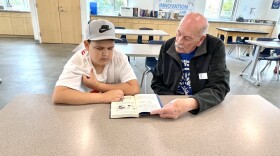 Jacob Medina, 12, is tutored by Roy Stone who is a volunteer with San Diego Oasis, San Diego, Calif., March 24, 2023. 