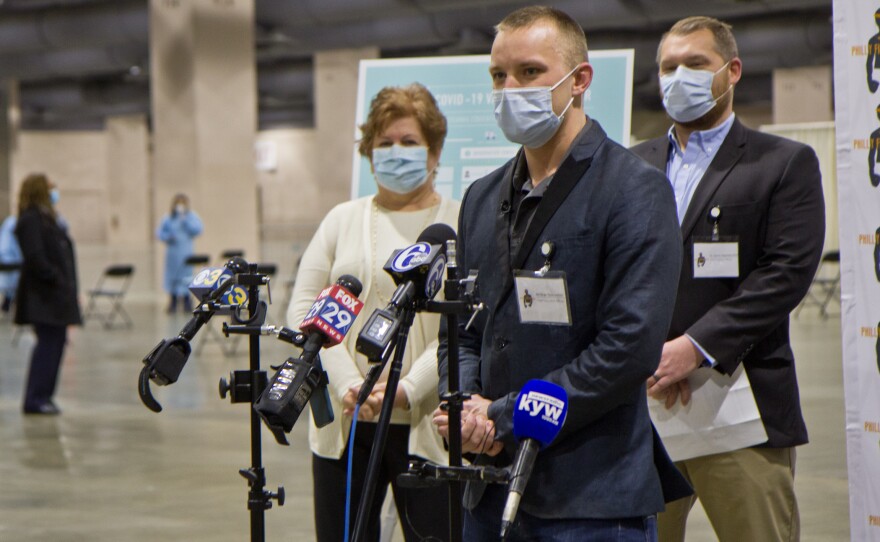 Andrei Doroshin, CEO of Philly Fighting COVID, speaks to reporters before the start of a COVID-19 vaccine clinic at the Pennsylvania Convention Center on January 8, 2021.