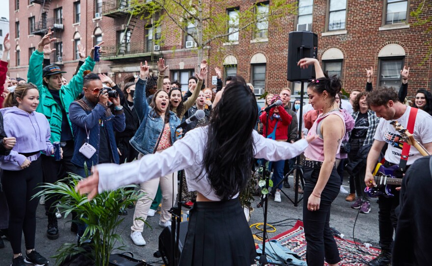 The band Daisy Grenade performs on Earth Day.