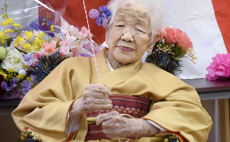 Kane Tanaka, born in 1903, smiles as a nursing home celebrates three days after her 117th birthday in Fukuoka, Japan, on Jan. 5, 2020.