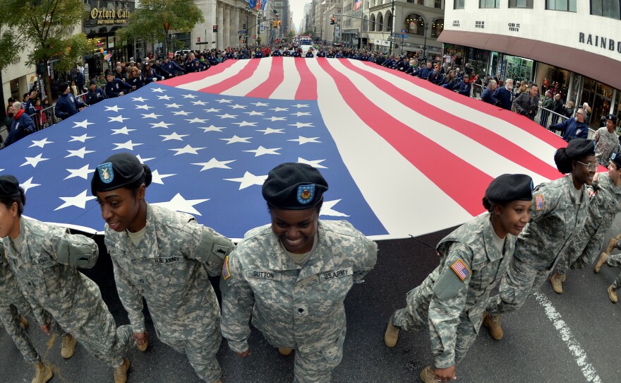 Members of the New York State National Guard march in the annual Veterans Day Parade on Fifth Avenue in New York Monday. The parade honored all veterans, with a special salute to women in uniform.