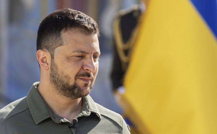 In this photo provided by the Ukrainian Presidential Press Office, Ukrainian President Volodymyr Zelenskyy attends an event for marking Statehood Day in Mykhailivska Square in Kyiv, Friday, July 28, 2023.