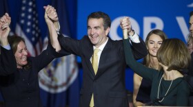 Virginia Gov.-elect Ralph Northam celebrates his election victory with his wife Pam and daughter Aubrey, right, and Dorothy McAuliffe, wife of Virginia Gov. Terry McAuliffe at the Northam For Governor election night party at George Mason University in Fairfax, Va., Tuesday, Nov. 7, 2017.