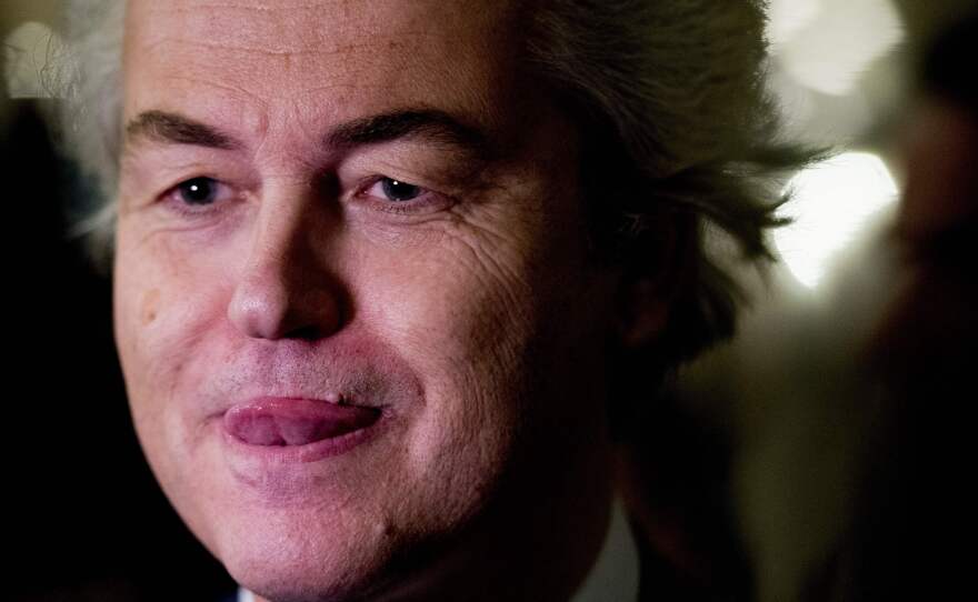 Geert Wilders speaks to the press on election night in The Hague, as returns showed the Liberal party of Dutch Prime Minister Mark Rutte set to win the most seats in the legislature.