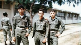 Tony Santiago (center) with two soldiers. Courtesy of Antonio Santiago