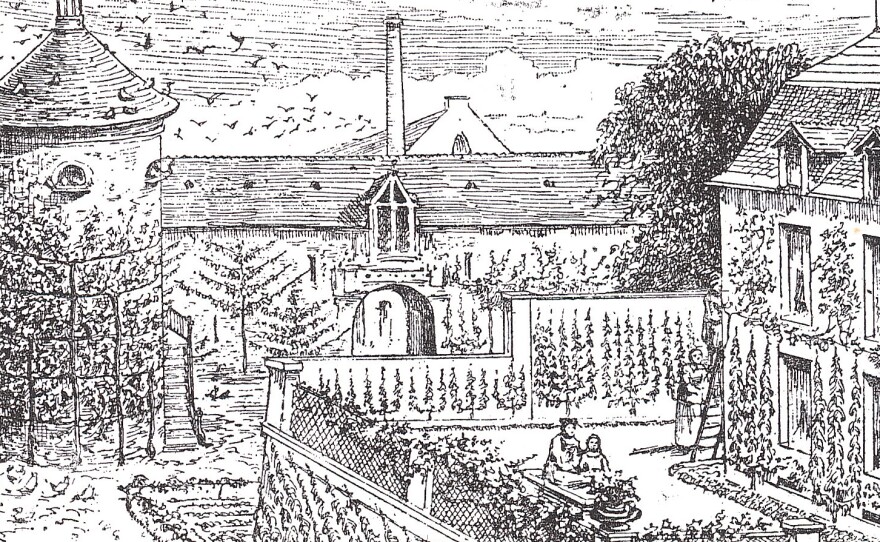 An illustration of a French property with pear and other fruit trees trained against the walls.