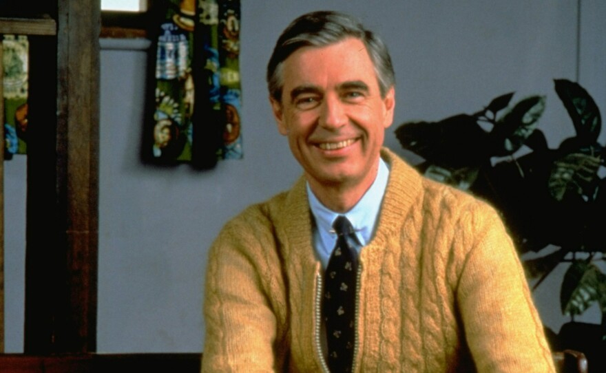 Fred Rogers poses on the Pittsburgh set of his television show Mister Rogers' Neighborhood in 1996.