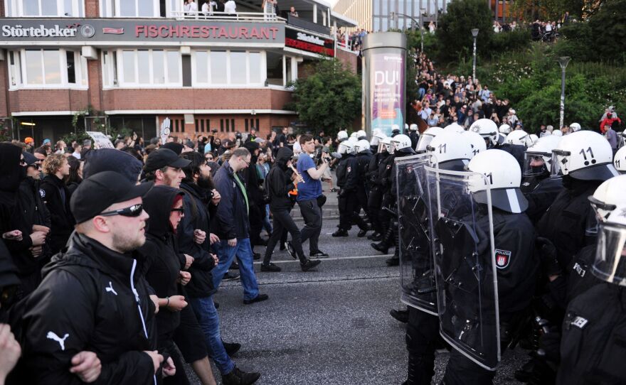 Protesters face riot police during what was supposed to be the "Welcome to Hell" rally against the G-20 summit in Hamburg on Thursday.