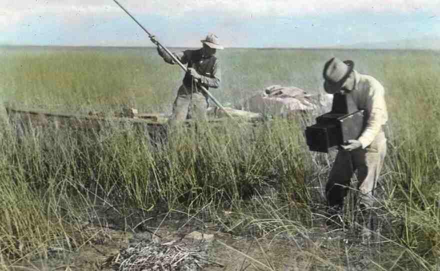 Finley photographs a nest as Bohlman maneuvers their boat through the shallows of Lake Malheur.