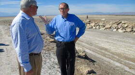 Bruce Wilcox, assistant secretary of Salton Sea policy for the California Natural Resources Agency, speaks with an attendee of a tour of the Salton Sea, March 16, 2017. 