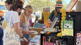 Attendees browse books at the 2026 KPBS Book Festival at the University of San Diego on Aug. 22, 2026.