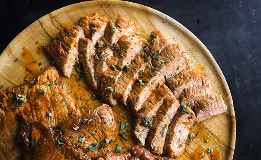 Seared Pork Tenderloin with Smoked Paprika and Oregano, which is finished with a flavorful paprika oil