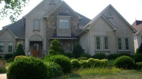 <p>Realtor Lee Brown says Charlotte, N.C., has a whole community of "starter castles" that were built during the housing boom. One foreclosed home is expected to go for about half the value it had in 2007.</p>