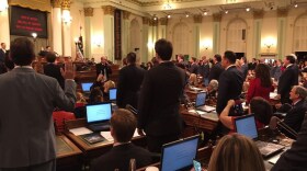 California Supreme Court Associate Justice Mariano-Florentino Cuéllar administers the oath of office to 80 Assembly members-elect at the state Capitol, Dec. 5, 2016.