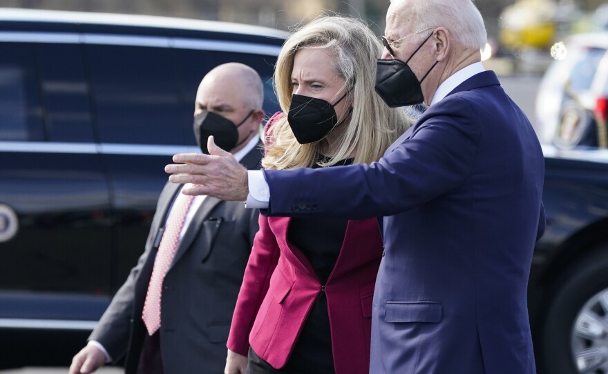 President Biden speaks with Rep. Abigail Spanberger, D-Va., as he arrives on Marine One at Culpeper Regional Airport on Feb. 10.
