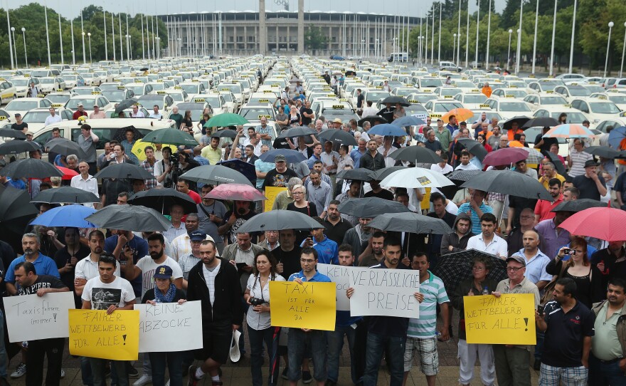 About 1,000 taxi drivers were expected during the protest Wednesday in Berlin. Here, demonstrators gather near Olympia Stadium.
