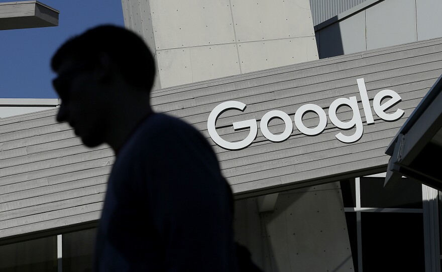 A man walks past a building on the Google campus in Mountain View, Calif. Google search results about health can be influential, but sometimes they can be unreliable or wrong.
