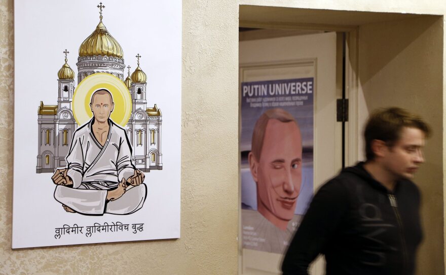 The Russian leader, shown here as "Vladimir Vladimirovich Buddha," was depicted as various pop culture heroes and religious, mythical and historical figures at a Moscow exhibition on Wednesday, his 63rd birthday.