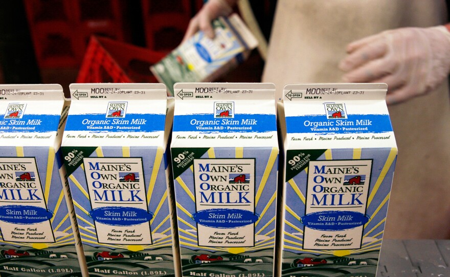 Organic milk is processed at a dairy farm in Westbrook, Maine. A new meta-analysis finds that organic milk contains significantly more omega-3 fatty acids than its conventional counterpart.