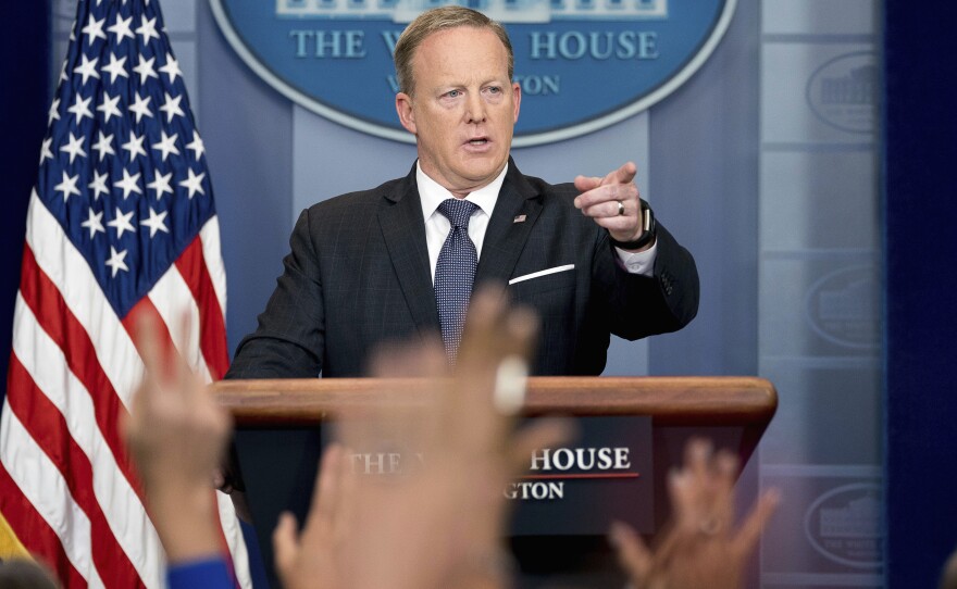 White House press secretary Sean Spicer calls on a member of the media during the daily press briefing at the White House on Tuesday.