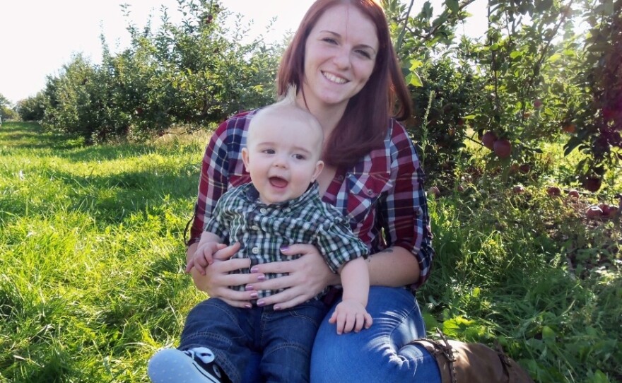 A former Marine herself, Kait Wyatt (seen with son Michael at an apple orchard in New York) says she is still struggling with the meaning of her husband's death. She knows he died doing what he believed in — and yet mourns the loss of her husband, and of her son's father.