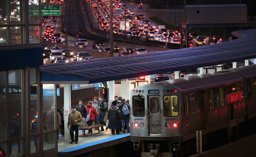 In Chicago, the Kennedy Expressway is clogged with cars as rush-hour commuters and Thanksgiving holiday travelers mix on Wednesday — one of the busiest travel days of the year.
