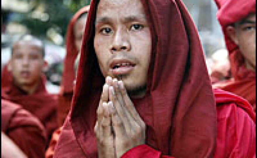 Buddhist monks march down a street in Yangon, Myanmar, on Tuesday despite warnings from the government.