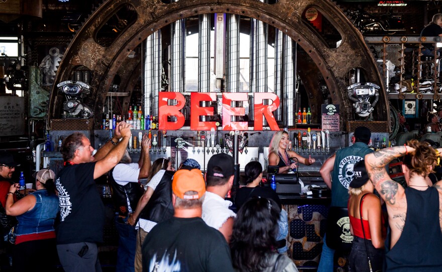 The Full Throttle Saloon in Sturgis, S.D., draws a crowd earlier this month during the 80th annual Sturgis Motorcycle Rally.