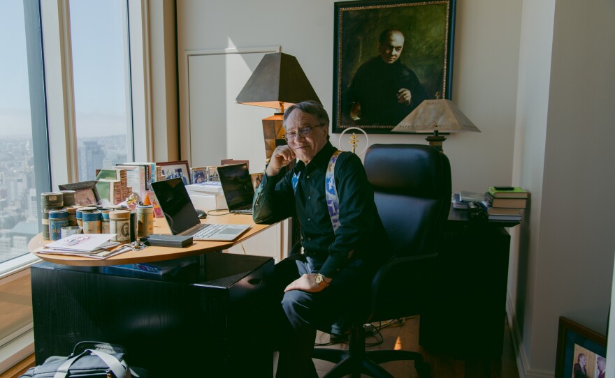 Ray Kurzweil poses for a portrait with a painting of his father, Fredric Kurzweil.