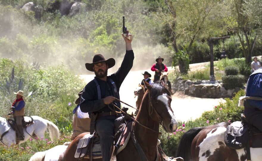 Actors depicted as cowboys are shown in the production of "Ramona" on April 20, 2023.